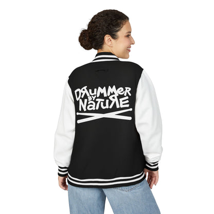 Model wearing Drummer By Nature black and white varsity jacket with back logo and crossed drumsticks